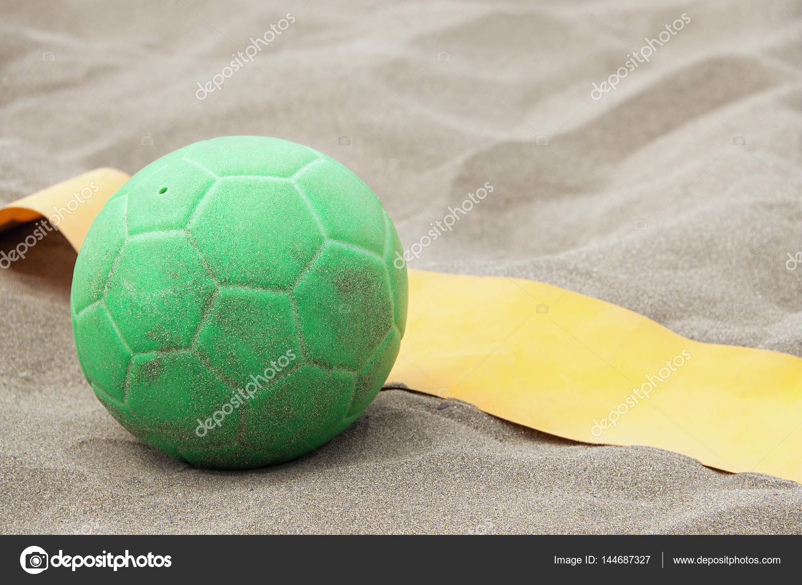 Handball ball on the beach Stock Photo by ©Pavel1964 144687327