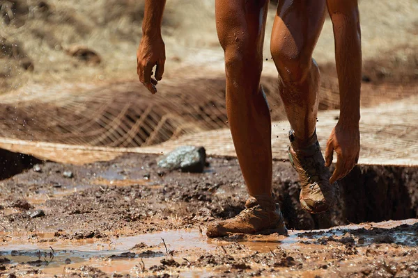 Course à la boue coureurs — Photo