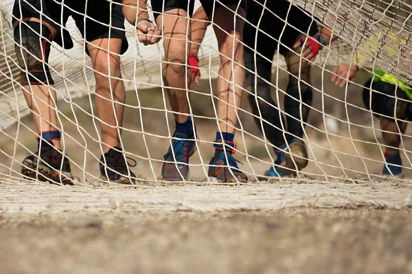 Mud Race Runners Fighting Get Out Net Obstacle Race — Stock Photo, Image