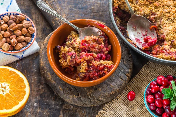 Cranberry, apple  and hazelnut crumble — Stock Photo, Image