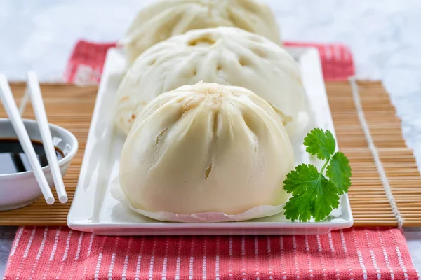Chinese steamed buns with meat and vegetables