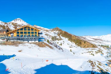 KLEINE SCHEIDEGG, SWITZERLAND - JANUARY 16, 2020: Kleine Scheidegg is a mountain pass, situated below and between the Eiger and Lauberhorn peaks in the Bernese Oberland region of Switzerland.