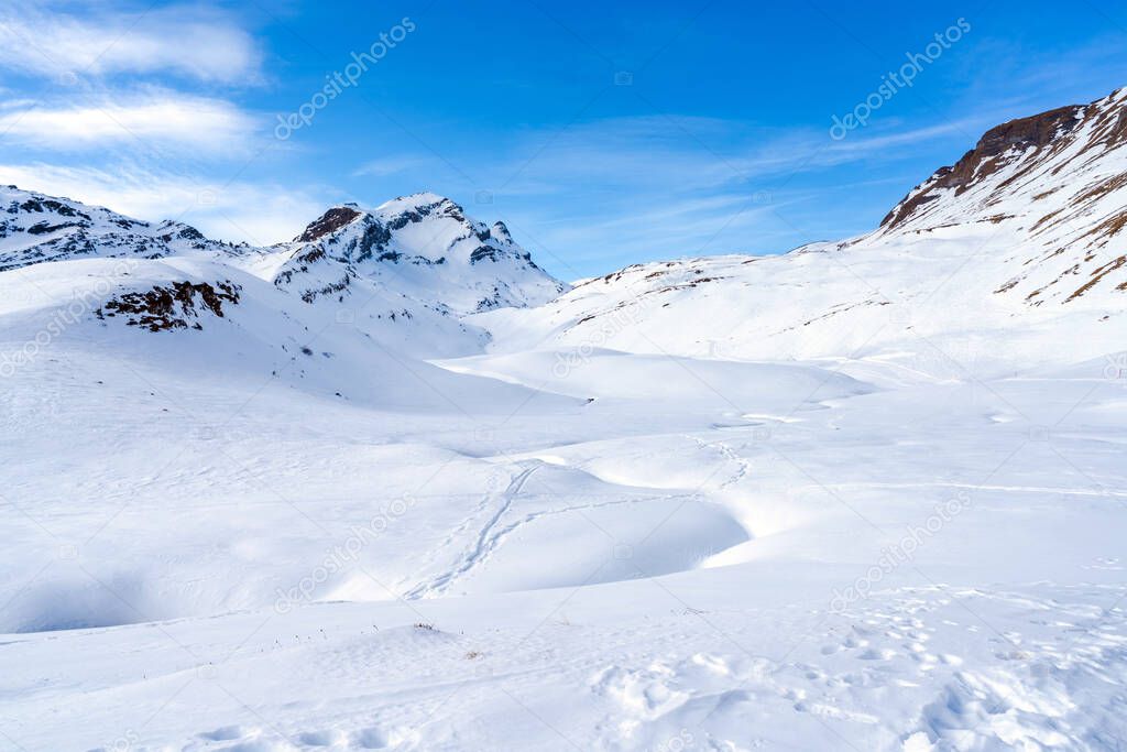Winter landscape on the First mountain in Swiss Alps, Grindelwald ski resort, Switzerland
