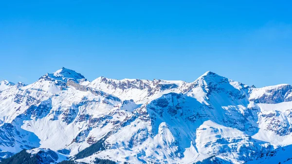 Zimowy Krajobraz Pokrytymi Śniegiem Szczytami Górze Kleine Scheidegg Alpach Szwajcarskich — Zdjęcie stockowe