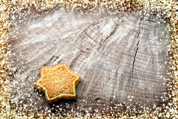 クリスマス ライトの背景と星のクッキー. — ストック写真