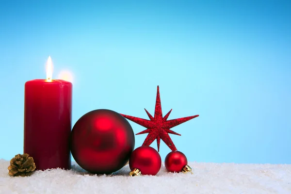 Christmas background with Advent candle and red star isolated . — Stock Photo, Image