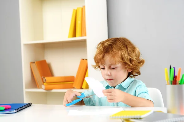 Intelligent preschooler studying at lesson — Stock Photo, Image
