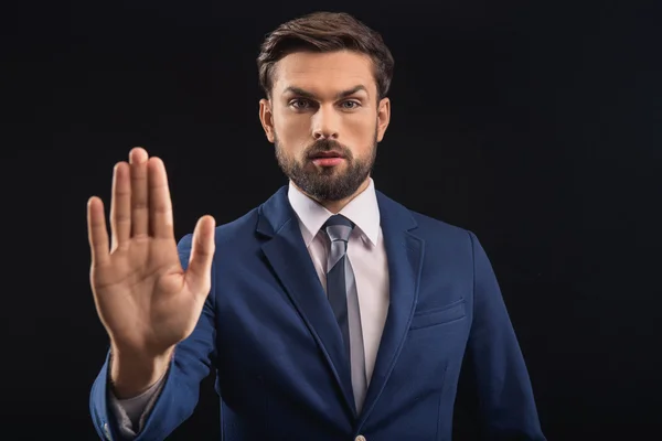 Serious male politician swearing in his innocence — Stock Photo, Image