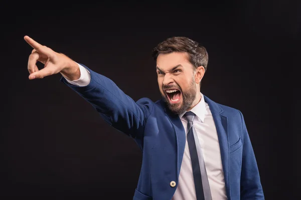 Hombre de negocios irritado expresando emociones negativas —  Fotos de Stock