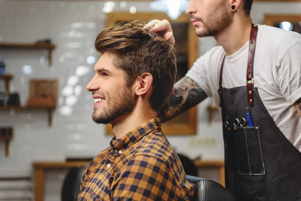 Close up of young customer in hair salon — Stock Photo, Image