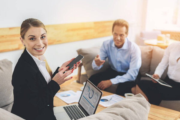 Colleagues having negotiation in friendly atmosphere