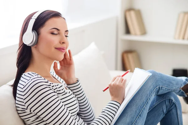 Listen wonderful sound and write — Stock Photo, Image