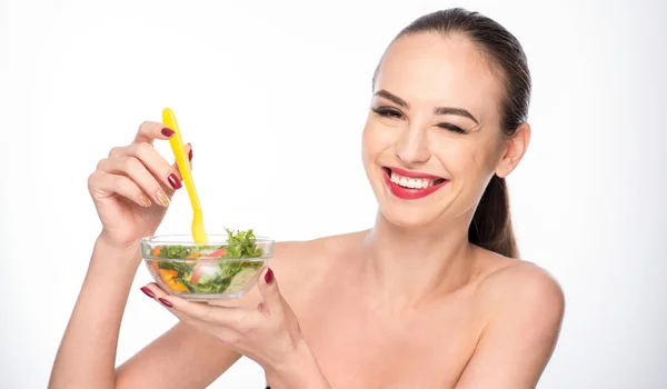 Lebensfrohe junge Frau, die Vitamine isst — Stockfoto