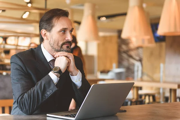 Serious man thinking about his business — Stock Photo, Image