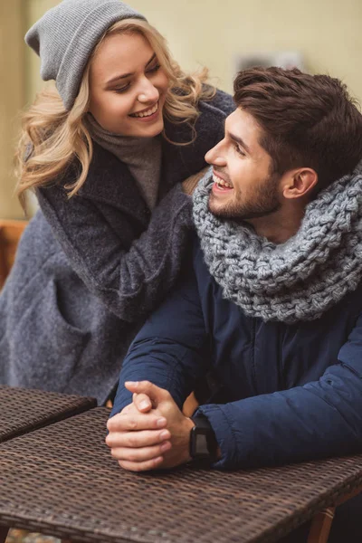 Cheerful lovers dating in cafeteria outside — Stock Photo, Image