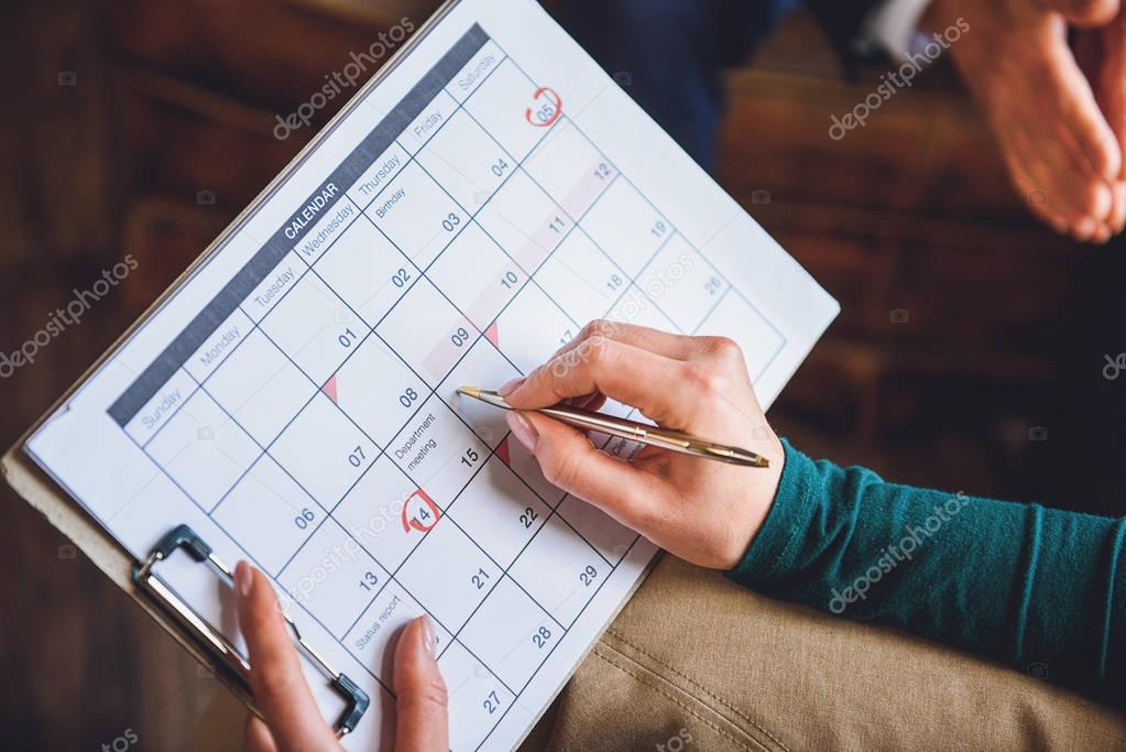 calendar in hands of psychologist