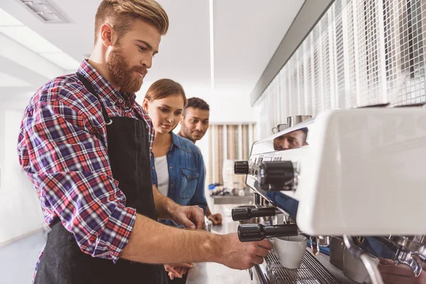 People trying to make coffee — Stock Photo, Image
