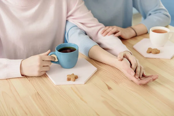 Lesbian girls resting together indoors — Stock Photo, Image