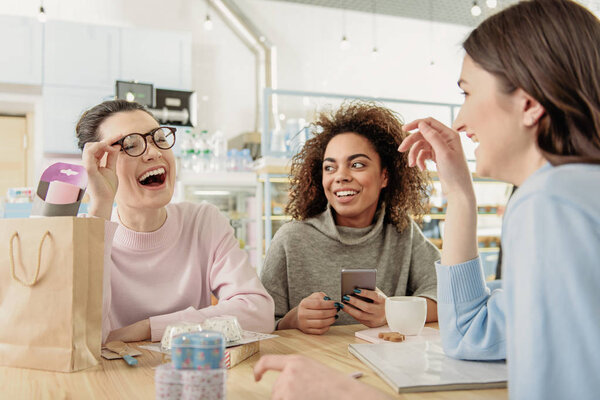 Hilarious female company in cafe
