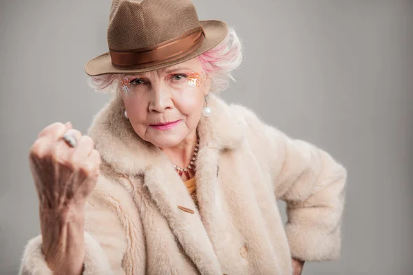 Strict stylish lady looking at camera — Stock Photo, Image