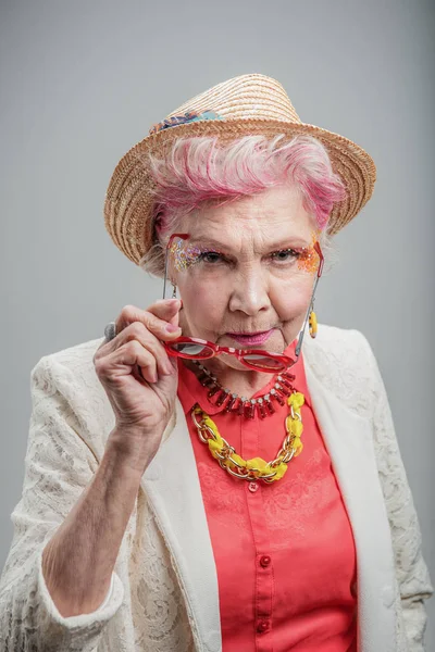 Good looking senior blond woman wearing hat — Stock Photo, Image