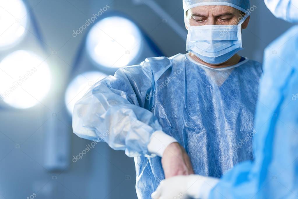 Serious doctor in operating room