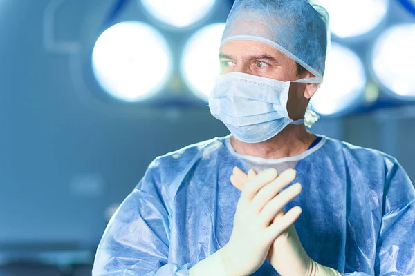 Serious doctor at space for operation — Stock Photo, Image
