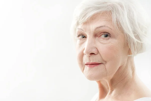 Serine senior lady with wrinkles on face — Stock Photo, Image