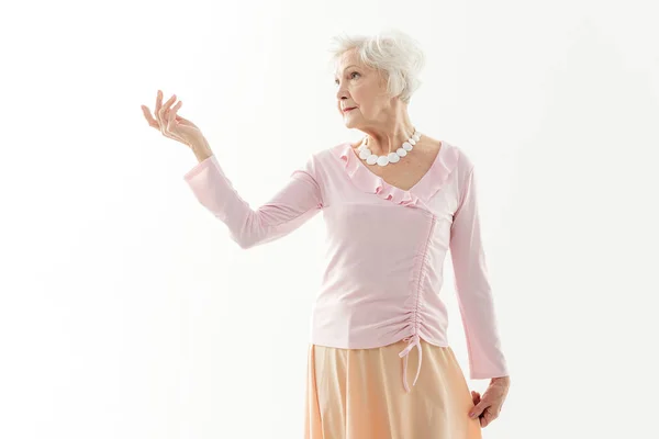 Senior lady posing in fashionable dress — Stock Photo, Image