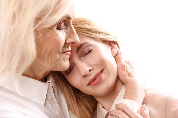 Old mother necking her daughter — Stock Photo, Image