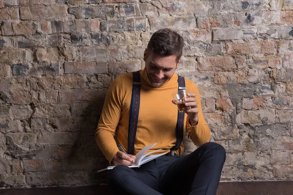 Joyful youthful male with glass — Stock Photo, Image