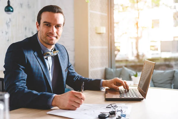 Outgoing male working at office — Stock Photo, Image