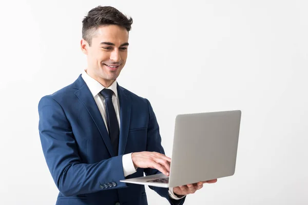 Outgoing male working with notebook computer — Stock Photo, Image