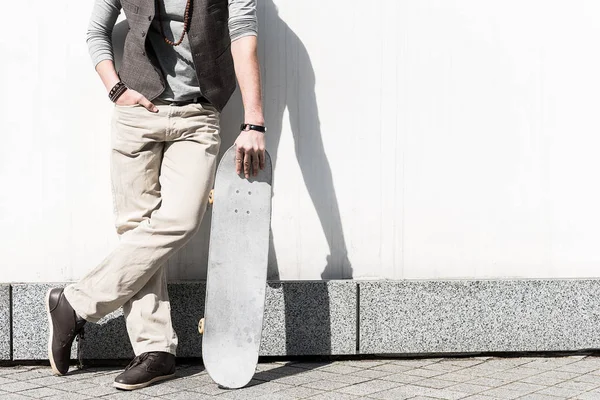 Stylish guy is standing outdoors — Stock Photo, Image