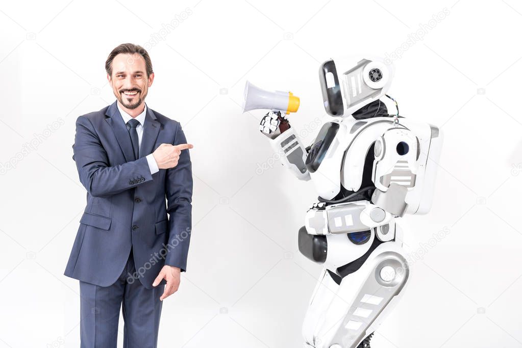 Happy smiling man beside cyborg