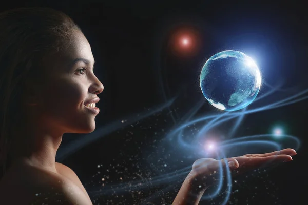 Happy mulatto girl with future touchscreen interface — Stock Photo, Image