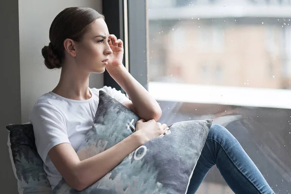 Sad beautiful girl resting at home during bad weather — Stock Photo, Image
