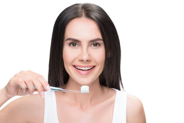 Joyful young woman is caring of her teeth — Stock Photo, Image