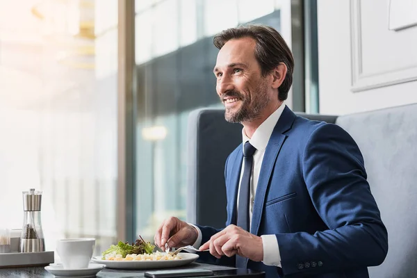 Joyful man having lunch in cafe — Stock Photo, Image