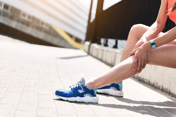 Girl suffering from ache in foot after jogging — Stock Photo, Image