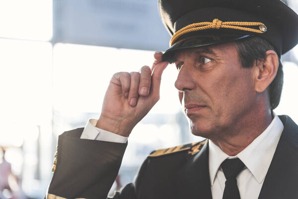 Calm pilot situating at airdrome