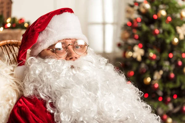 Cheerful old man in red costume wishing Merry Christmas — Stock Photo, Image