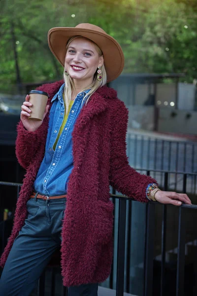 Joyful blond lady drinking hot espresso outdoor — Stock Photo, Image