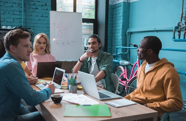 Thoughtful business team working together — Stock Photo, Image