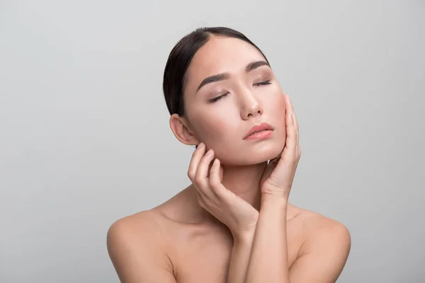 Sensual young woman is enjoying her skin — Stock Photo, Image