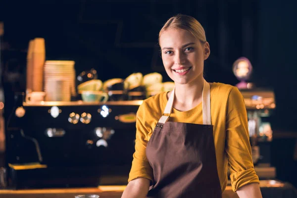 Cheerful girl working in confectionary shop — Stock Photo, Image