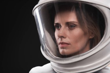 Skilled female astronaut is feeling sadness clipart