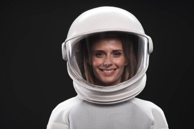 Attractive spacewoman is expressing gladness clipart