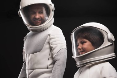 Interested family of astronauts are discovering new planet clipart