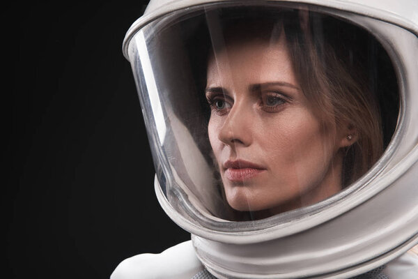 Skilled female astronaut is feeling sadness